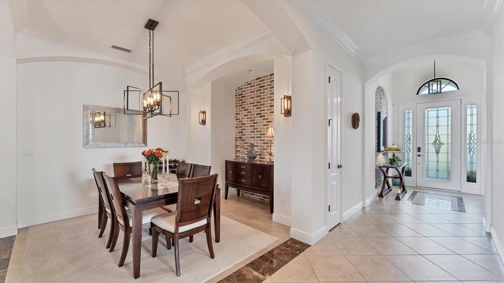 7833 Valderrama Way Lakewood Ranch, FL 34202 - Photo 6 of 63 a view of a livingroom with furniture and window