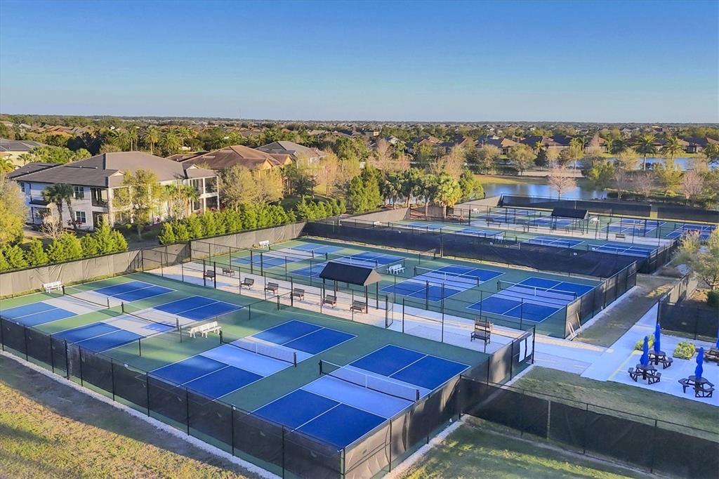 7833 Valderrama Way Lakewood Ranch, FL 34202 - Photo 61 of 63 a view of a balcony with table and chairs