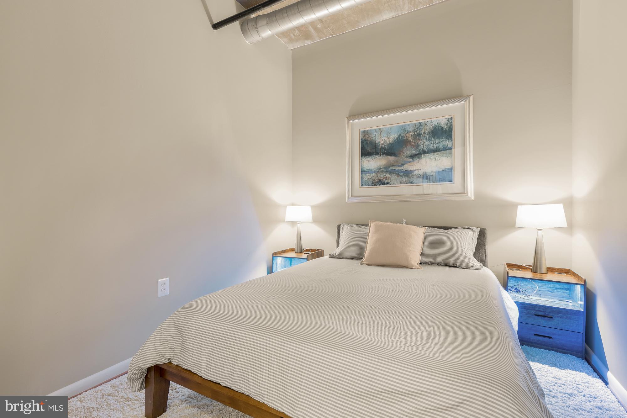 1300 N Street Northwest, Unit 809 Washington, DC 20005 - Photo 6 of 27 Cozy retreat with serene artwork.