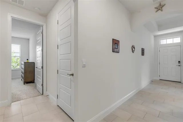 a bedroom with a bed and a cabinets