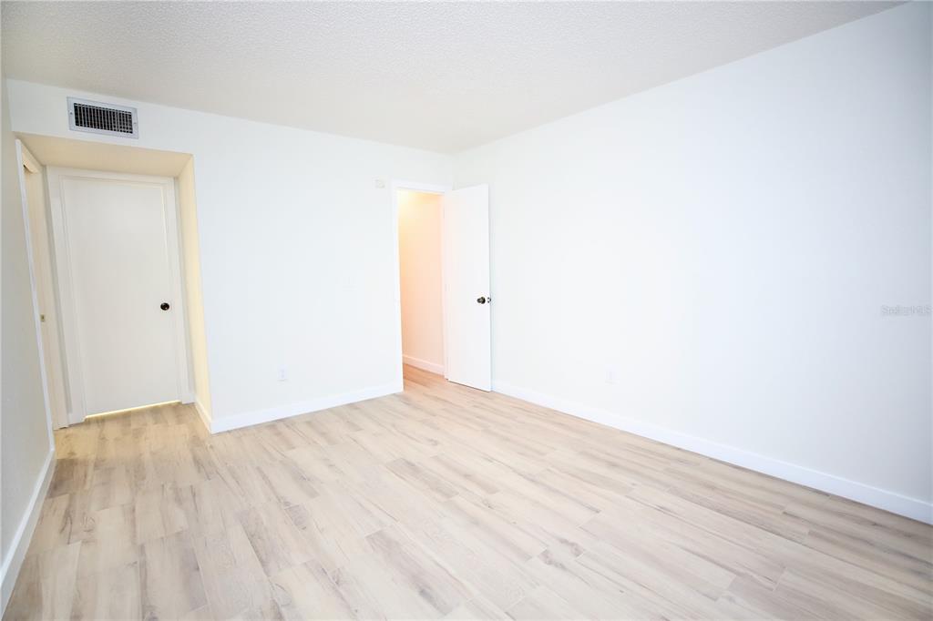 11702 Raintree Village Boulevard, Unit B Temple Terrace, FL 33617 - Photo 16 of 38 a view of an empty room