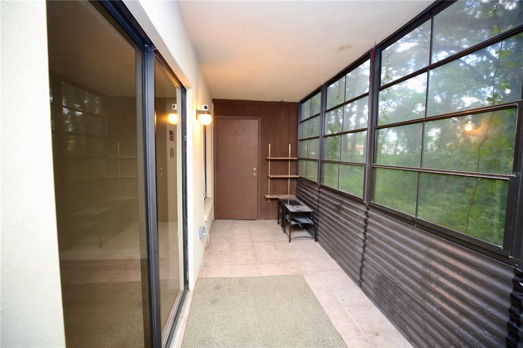 11702 Raintree Village Boulevard, Unit B Temple Terrace, FL 33617 - Photo 23 of 38 a view of a balcony