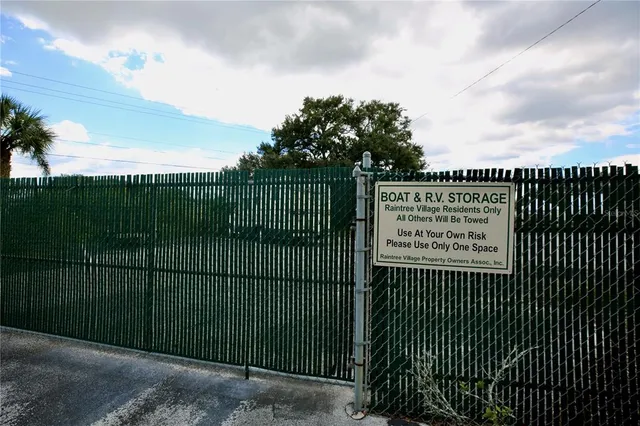 a huge green field with lots of trees