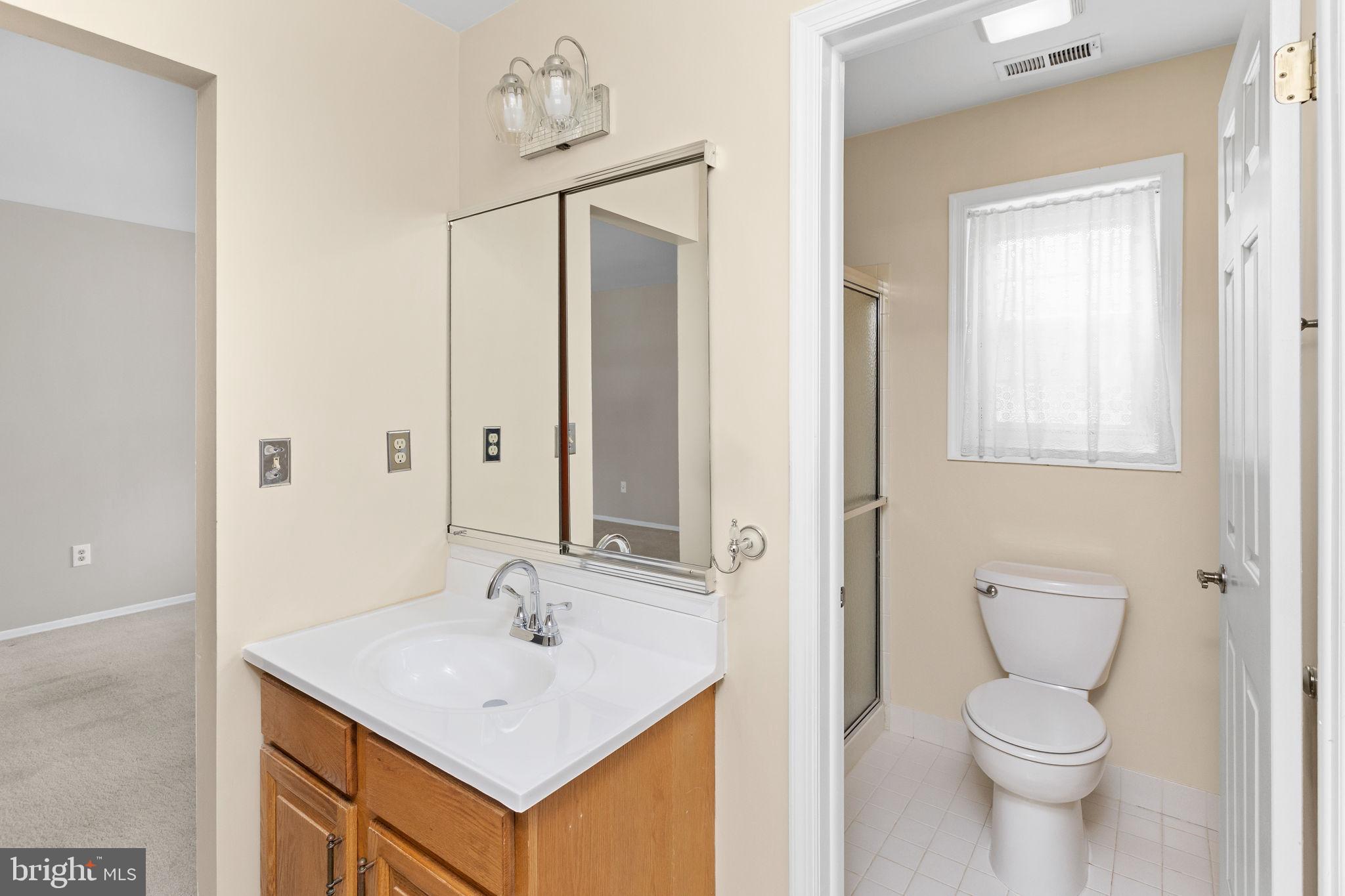 12 Candlelight Circle Columbus, NJ 08022 - Photo 14 of 17 a bathroom with a sink toilet and shower