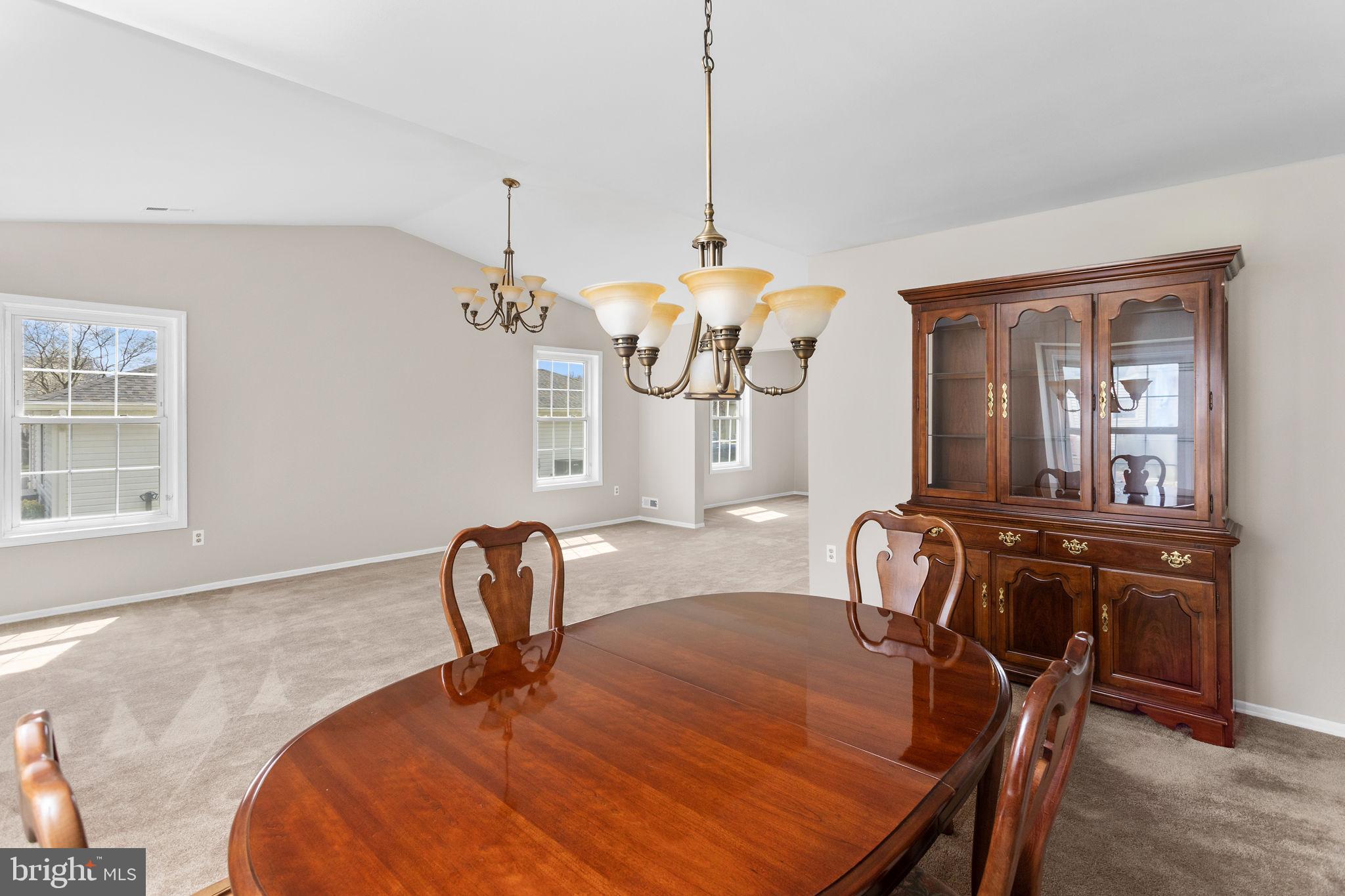 12 Candlelight Circle Columbus, NJ 08022 - Photo 7 of 17 a room with a table chairs and windows