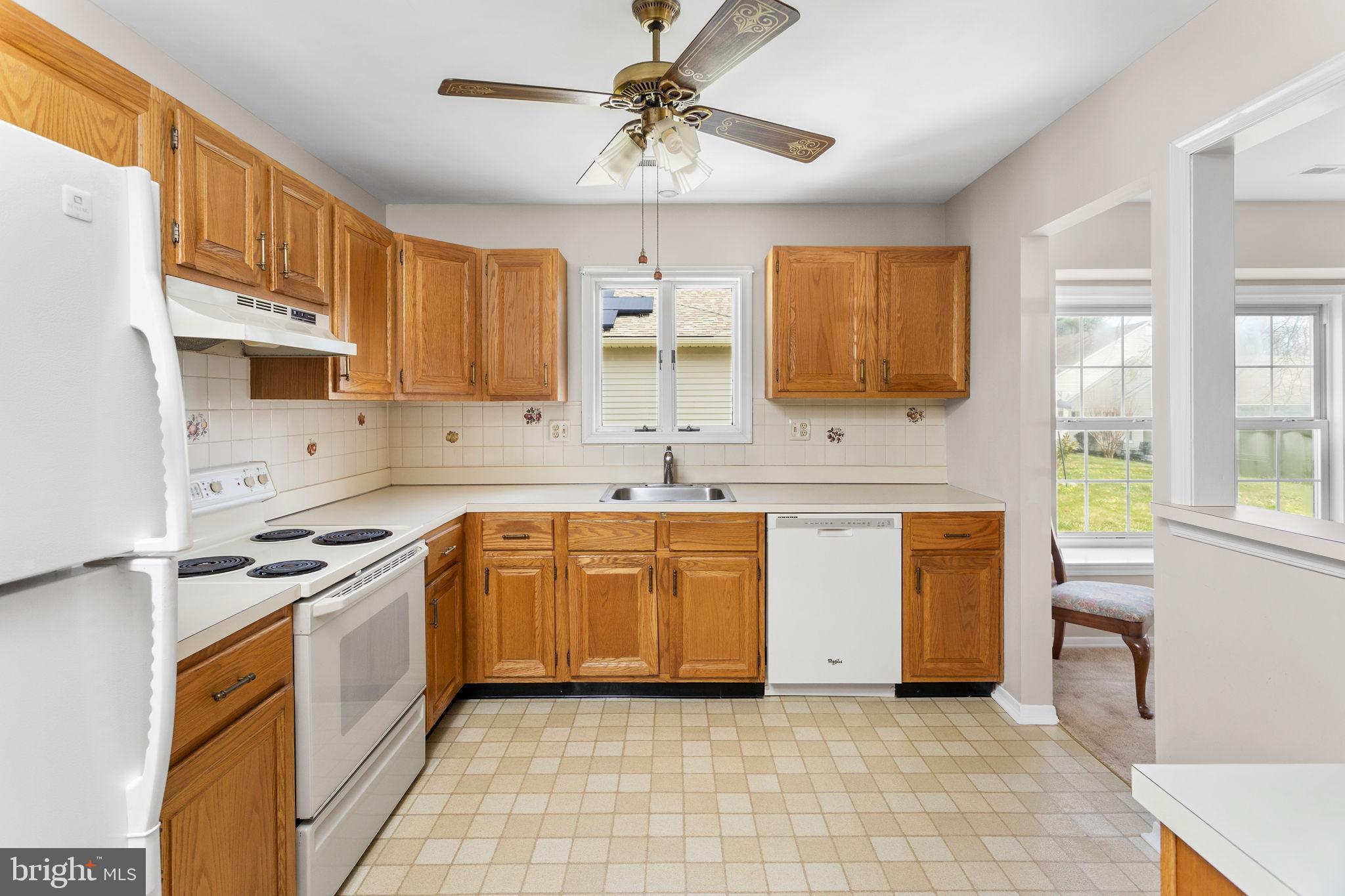 12 Candlelight Circle Columbus, NJ 08022 - Photo 8 of 17 a kitchen with stainless steel appliances a stove sink and cabinets