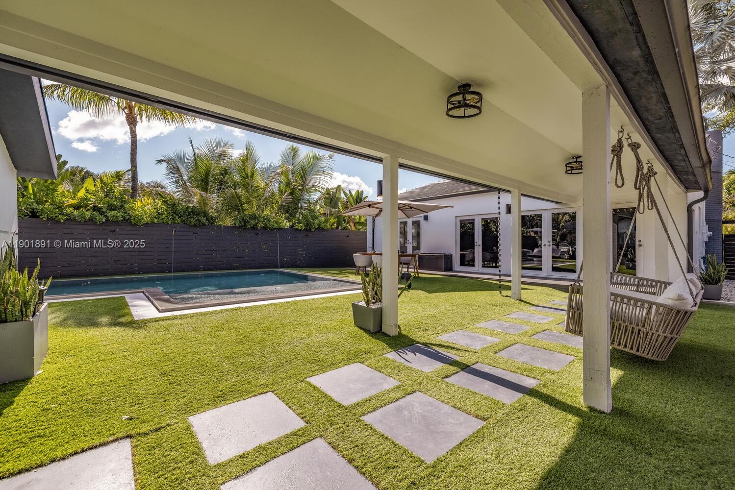 901 Northwest 7th Street Miami, FL 33136 - Photo 37 of 98 a view of swimming pool with seating area