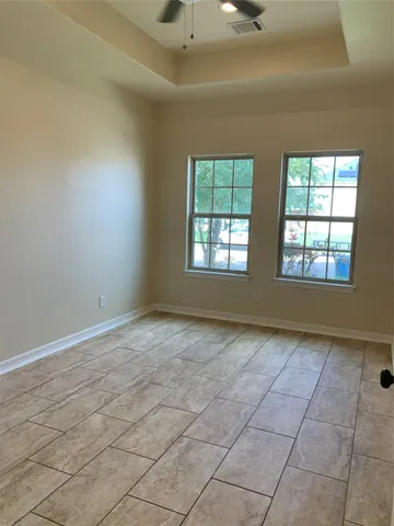 an empty room with windows