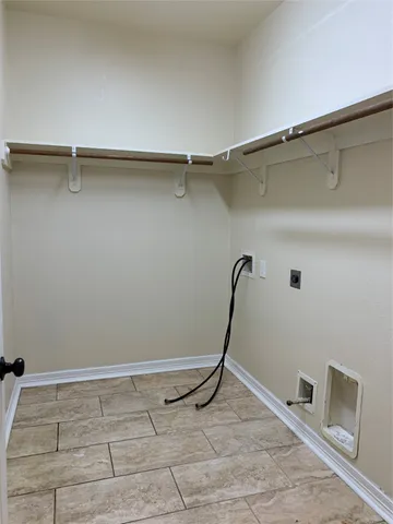 a view of a room with racks on the wall