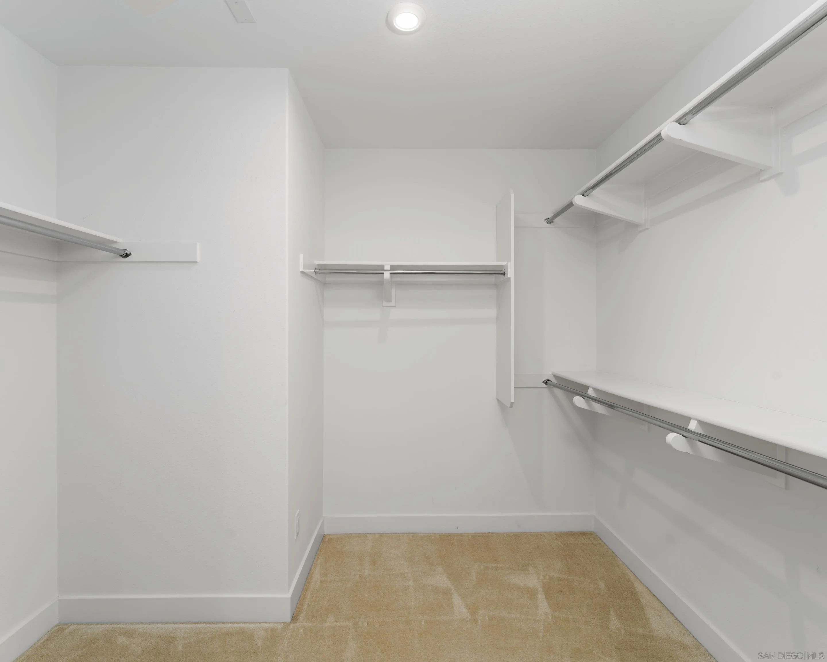 2731 Via Avella San Diego, CA 92108 - Photo 12 of 39 a view of a room with empty racks