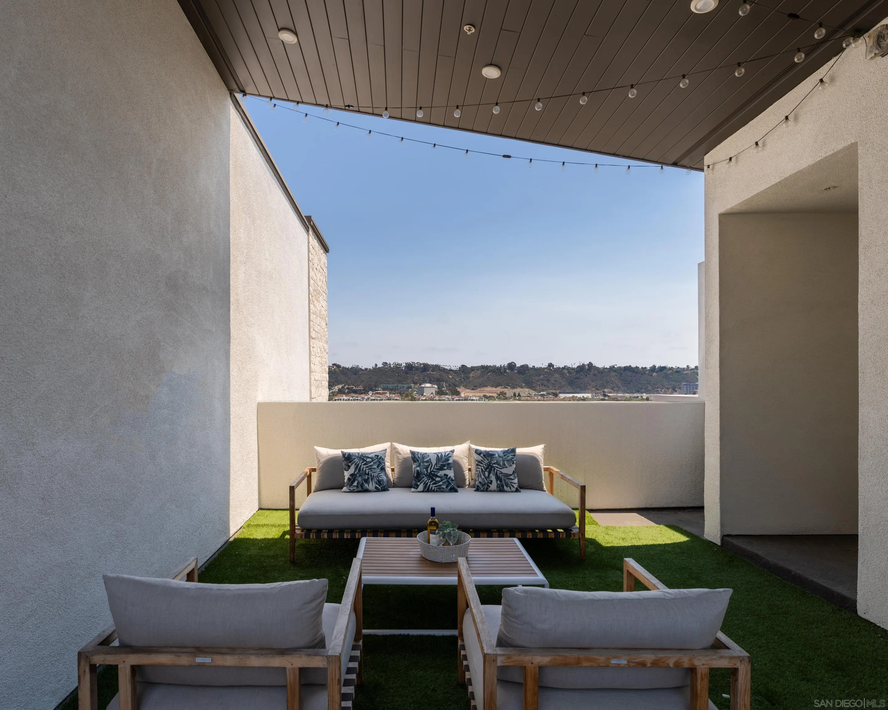 2731 Via Avella San Diego, CA 92108 - Photo 18 of 39 a terrace with outdoor seating and lake view