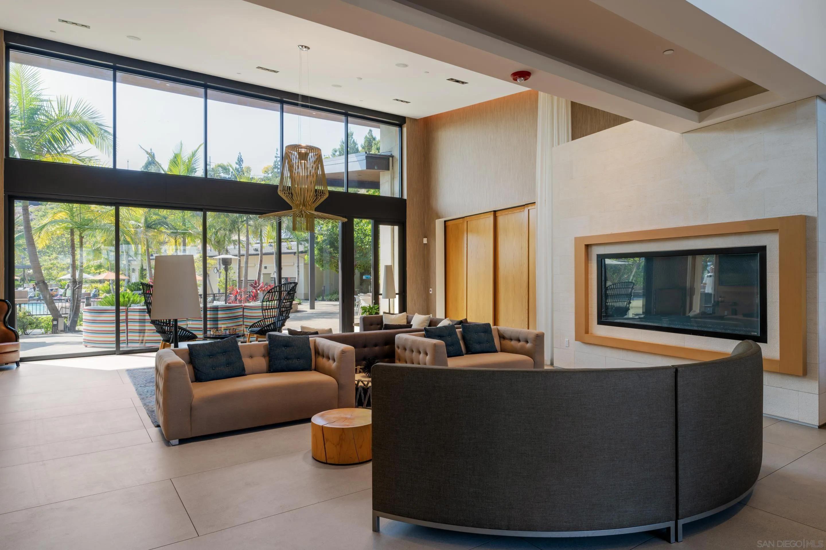 2731 Via Avella San Diego, CA 92108 - Photo 28 of 39 a living room with furniture large window and flat screen tv