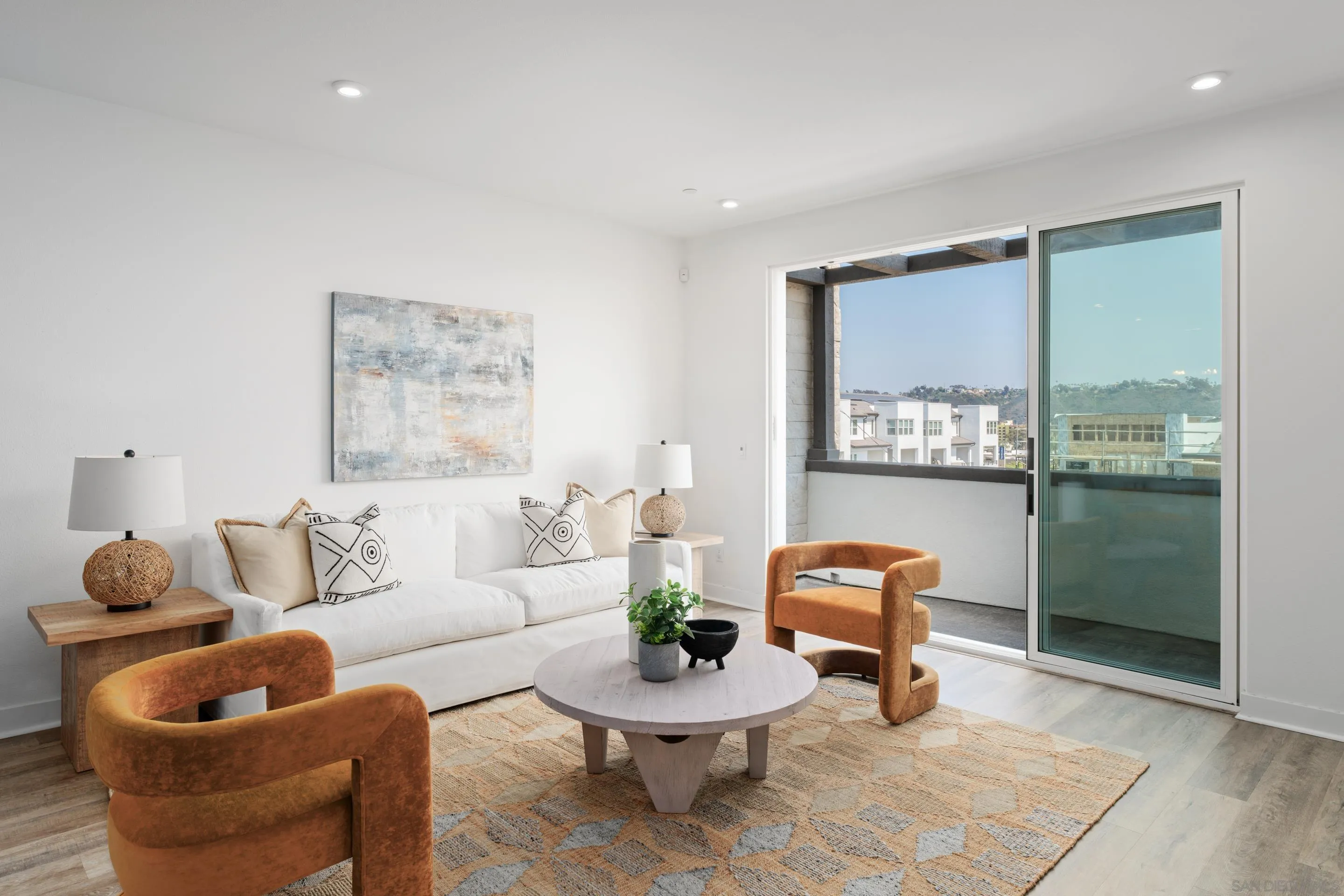 2731 Via Avella San Diego, CA 92108 - Photo 5 of 39 a living room with furniture and a large window