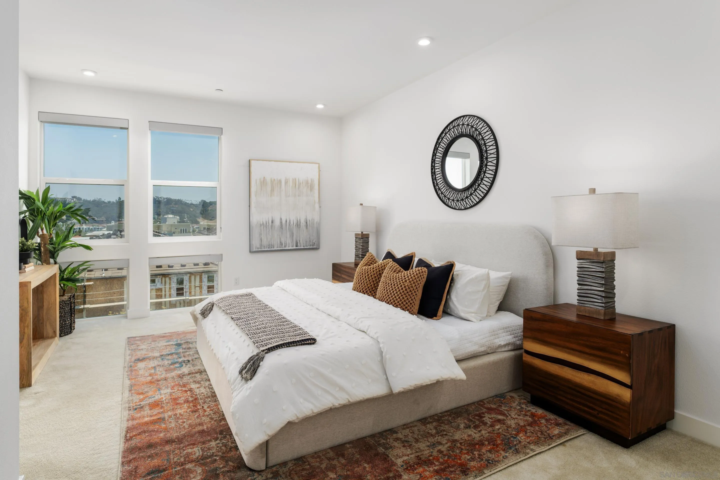 2731 Via Avella San Diego, CA 92108 - Photo 8 of 39 a bedroom with bed and a potted plant with the dresser