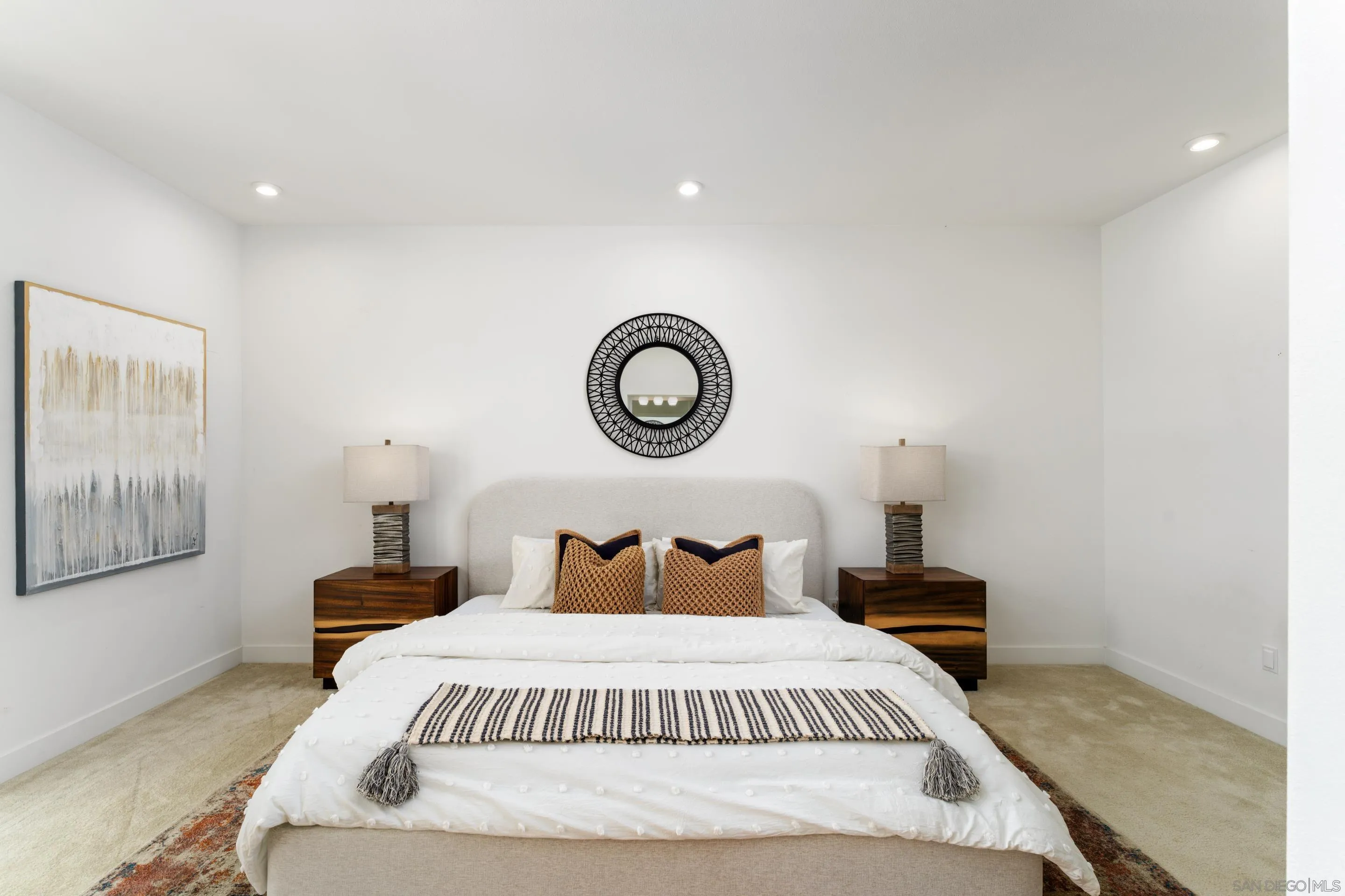 2731 Via Avella San Diego, CA 92108 - Photo 10 of 39 a bedroom with bed and a lamp on table