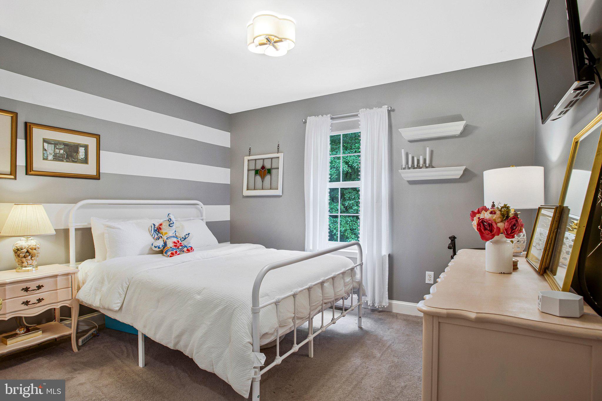 1582 Snug Harbor Road Shady Side, MD 20764 - Photo 33 of 53 Charming retreat with striped walls.