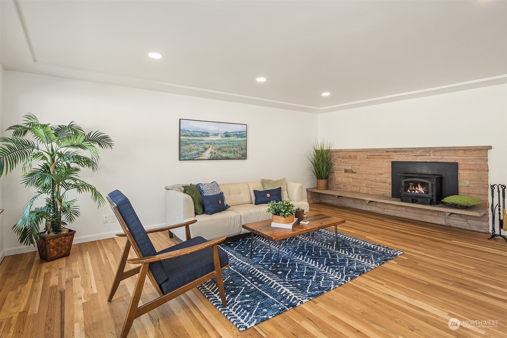 1834 North 183rd Street Shoreline, WA 98133 - Photo 12 of 40 a living room with furniture and a fireplace