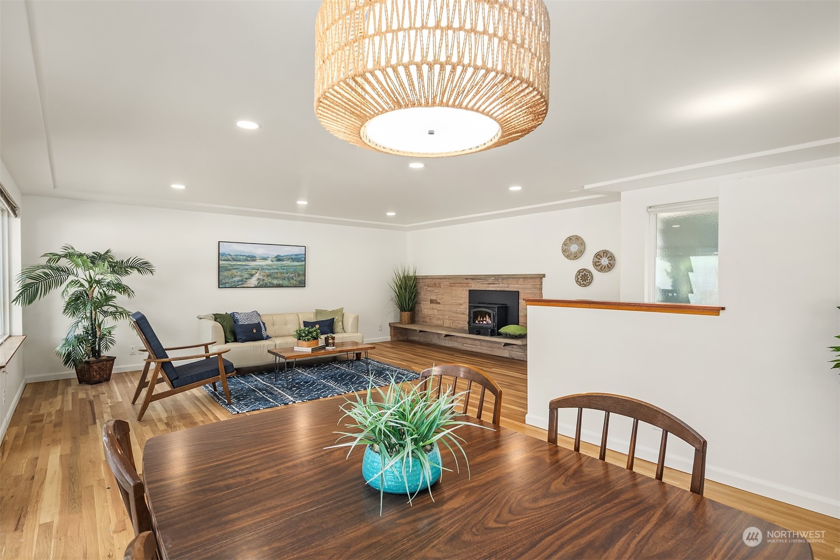 1834 North 183rd Street Shoreline, WA 98133 - Photo 13 of 40 a living room with fireplace furniture and a wooden floor