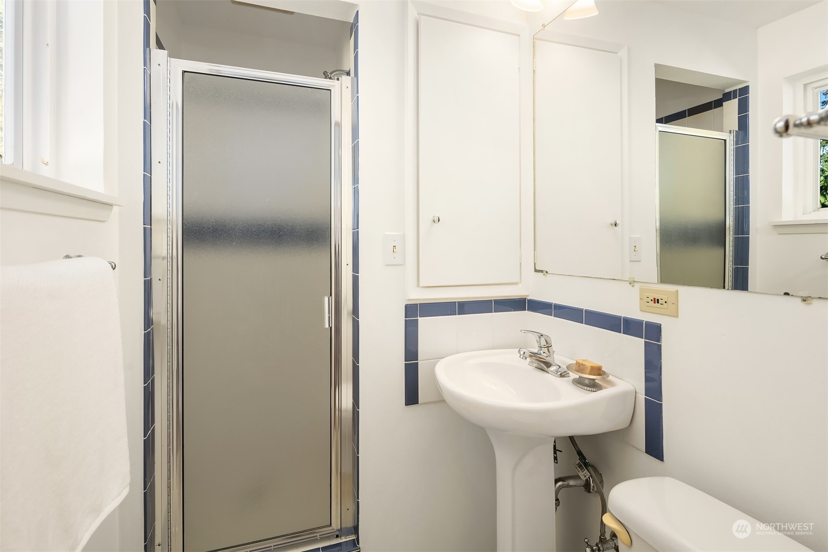 1834 North 183rd Street Shoreline, WA 98133 - Photo 20 of 40 a bathroom with a sink toilet and mirror