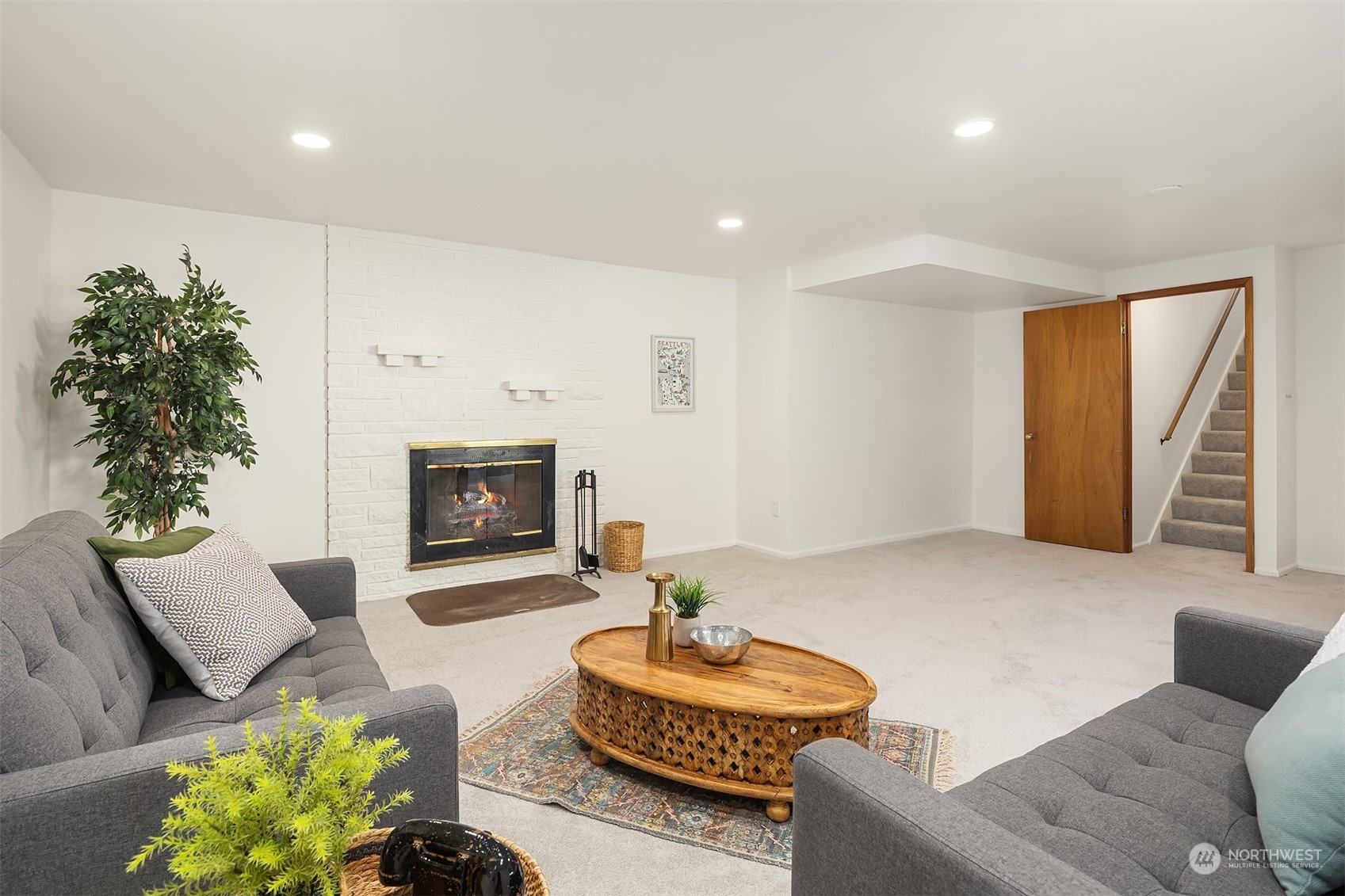 1834 North 183rd Street Shoreline, WA 98133 - Photo 25 of 40 a living room with furniture and a fireplace