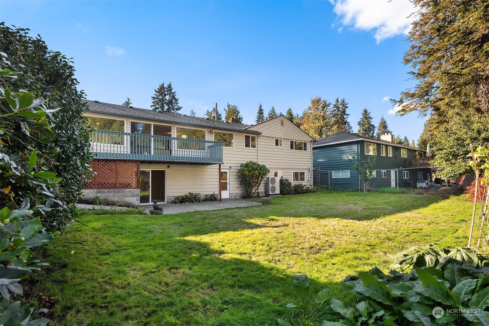 1834 North 183rd Street Shoreline, WA 98133 - Photo 34 of 40 a view of a house with a yard and sitting area