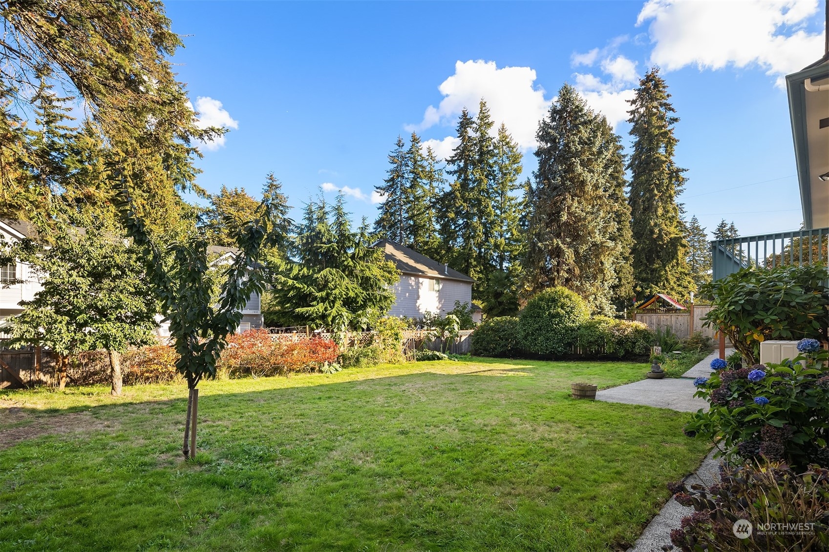 1834 North 183rd Street Shoreline, WA 98133 - Photo 36 of 40 a view of a backyard with large trees