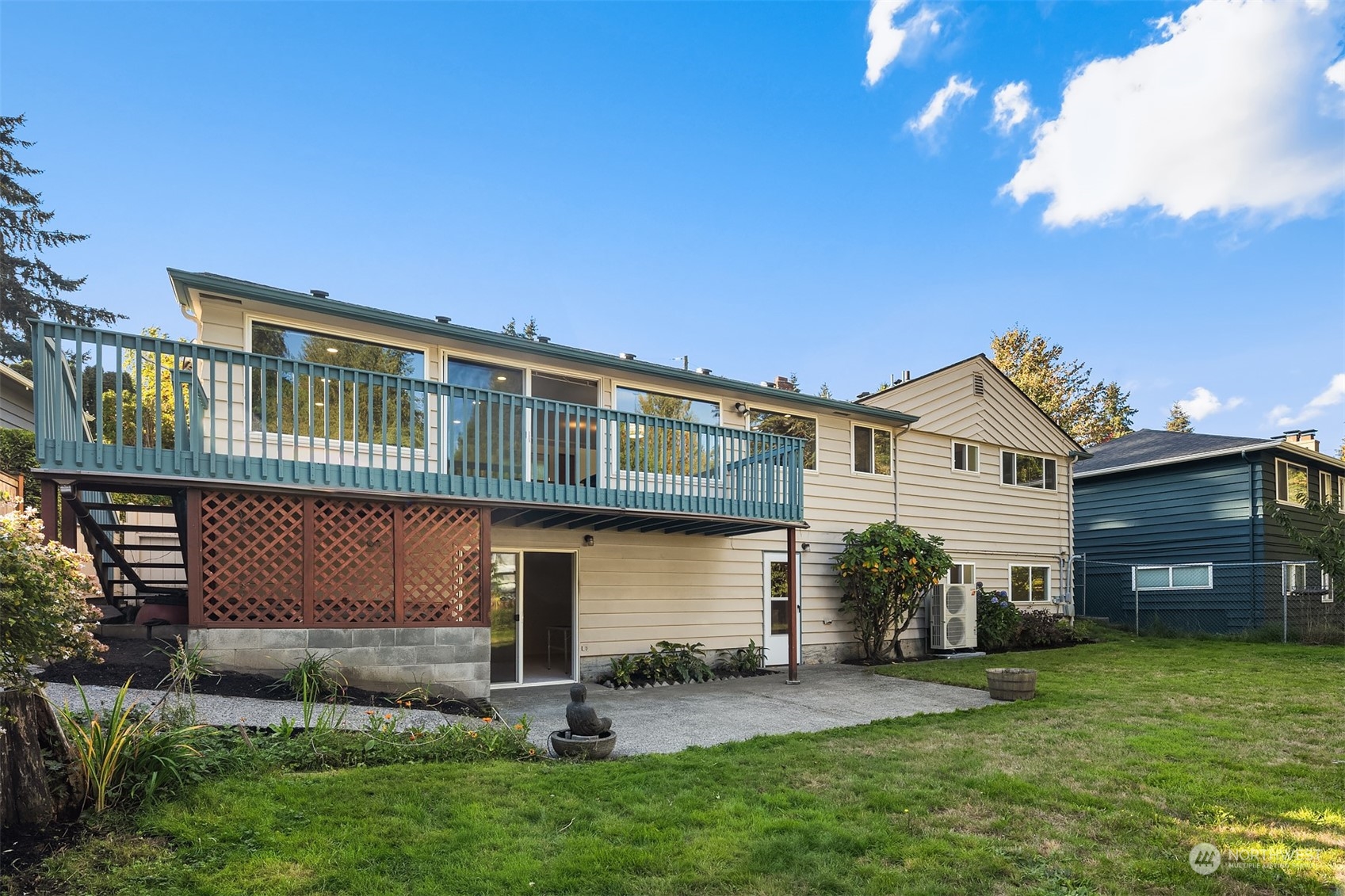 1834 North 183rd Street Shoreline, WA 98133 - Photo 38 of 40 a front view of a house with a garden and plants
