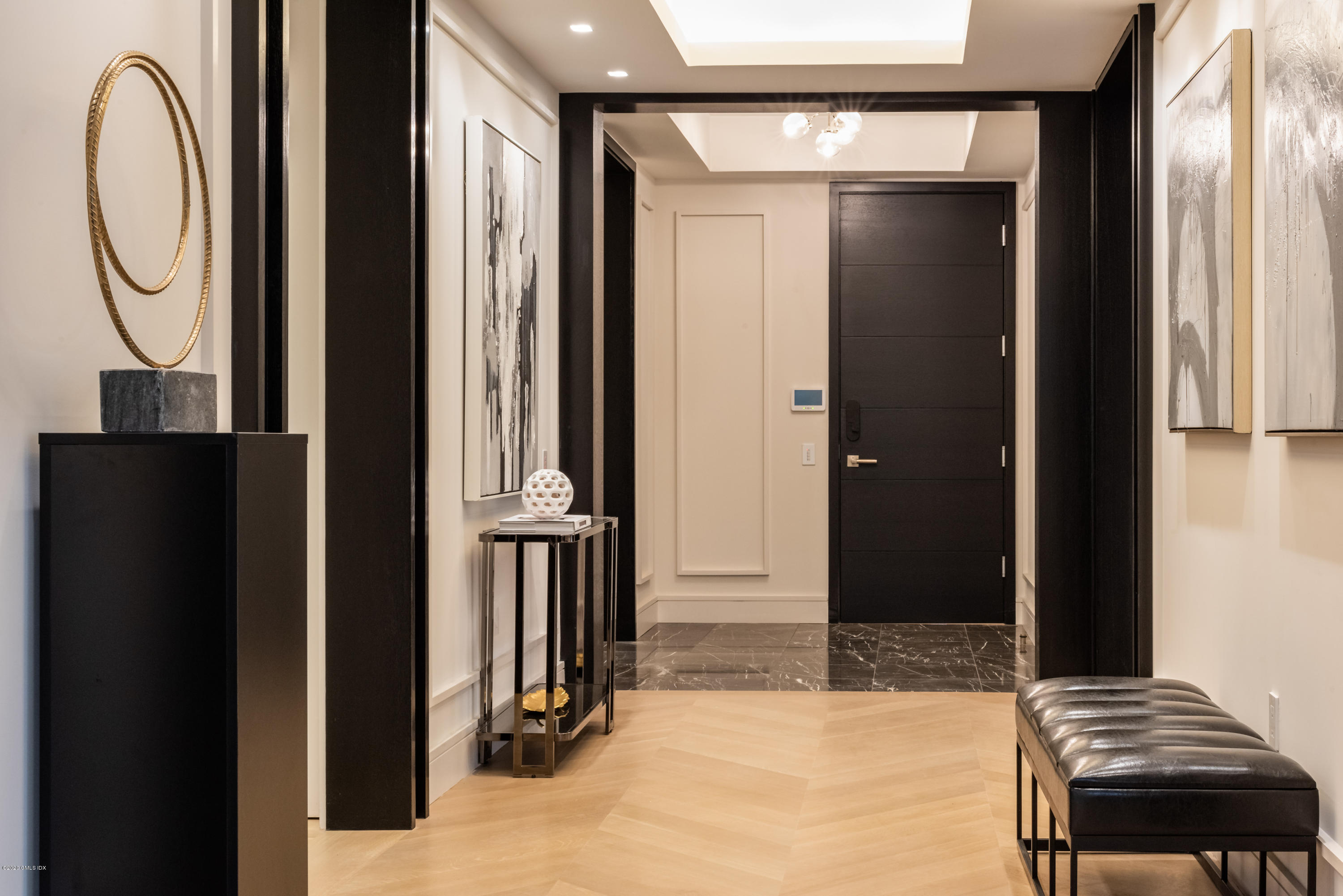 125 Field Point Road, Unit 1A Greenwich, CT 06830 - Photo 25 of 25 a view of a hallway with painted walls