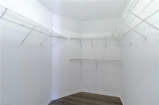 a view of a room with racks on the wall
