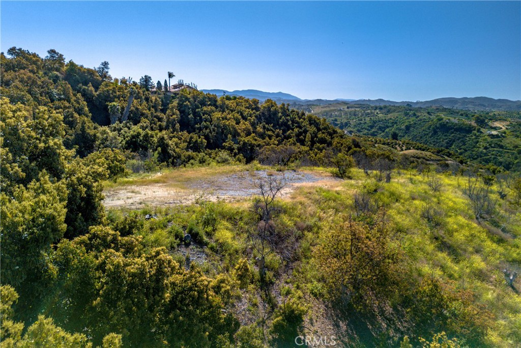 22103 Carancho Road Temecula, CA 92590 - Photo 18 of 27 a view of a yard with an outdoor space and seating