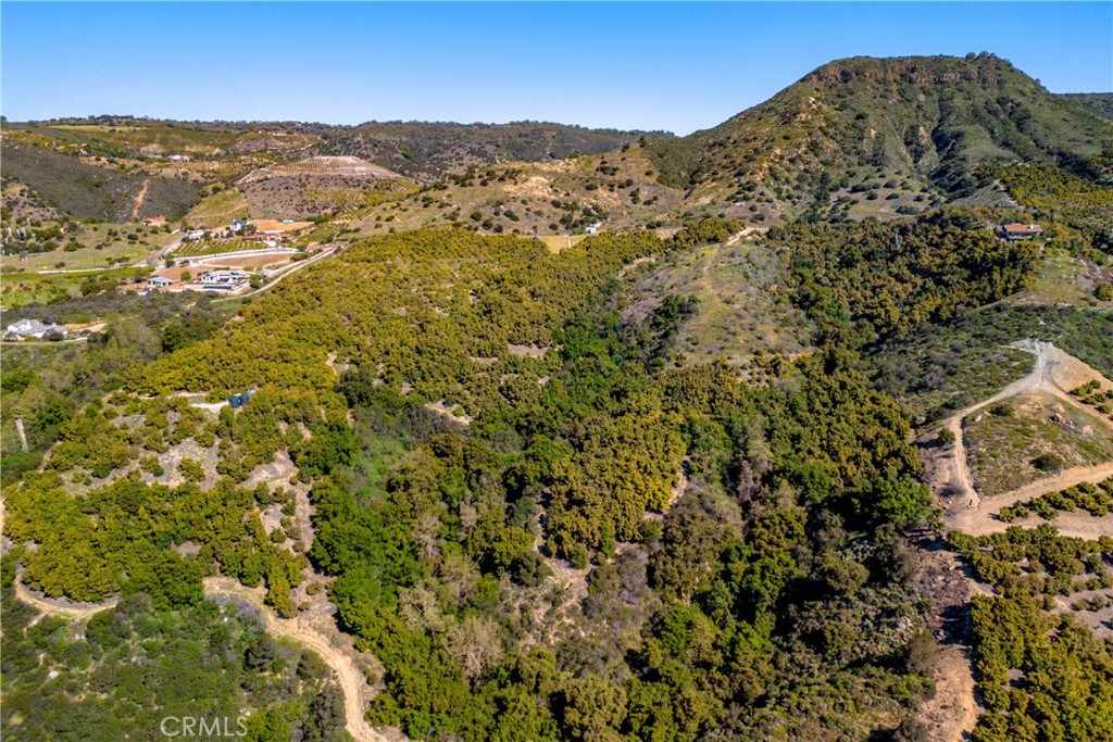 22103 Carancho Road Temecula, CA 92590 - Photo 4 of 27 a view of a large body of water with a building in the background