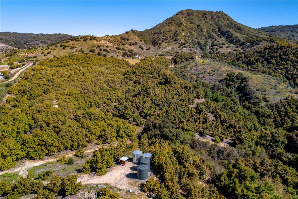 22103 Carancho Road Temecula, CA 92590 - Photo 5 of 27 a view of a large building with mountains in the background