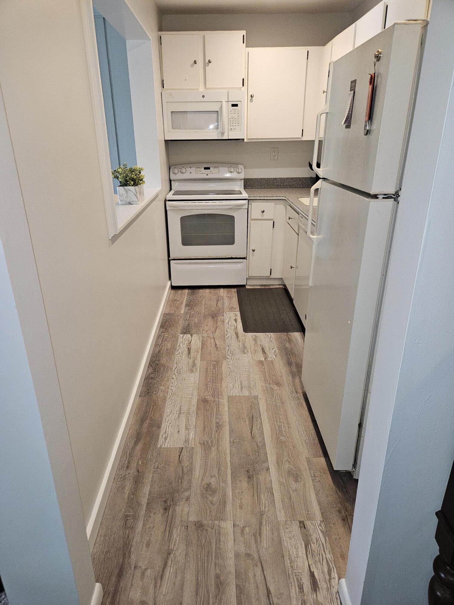 92 Red Chimney Road, Unit 3 Geneva, WI 53147 - Photo 9 of 41 New Kitchen Floor