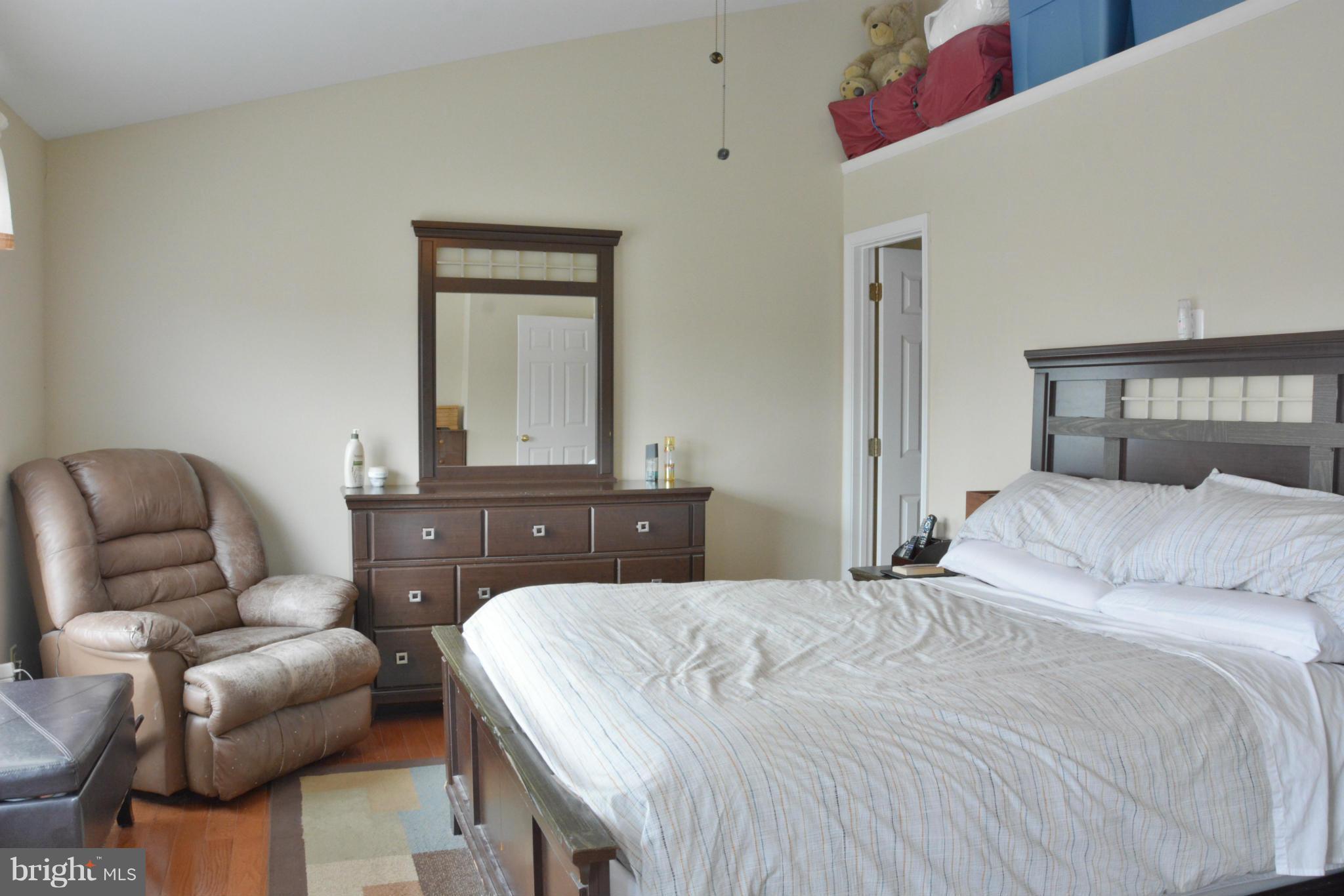 45322 Gable Square Sterling, VA 20164 - Photo 16 of 30 a bedroom with a bed and couch