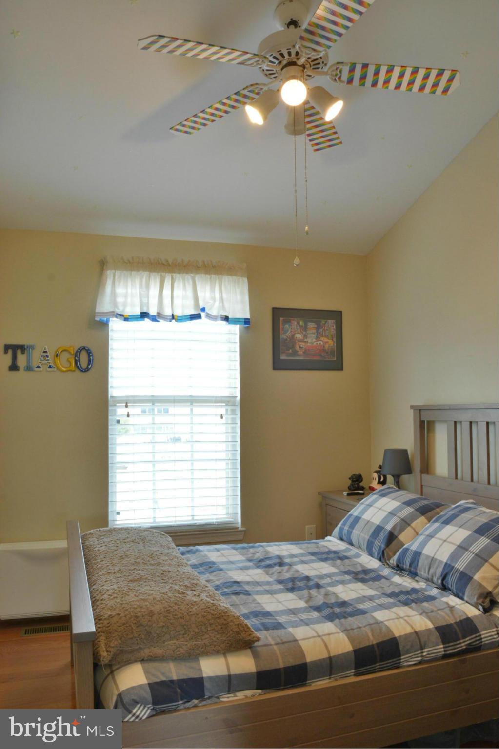 45322 Gable Square Sterling, VA 20164 - Photo 20 of 30 a bedroom with a bed and window