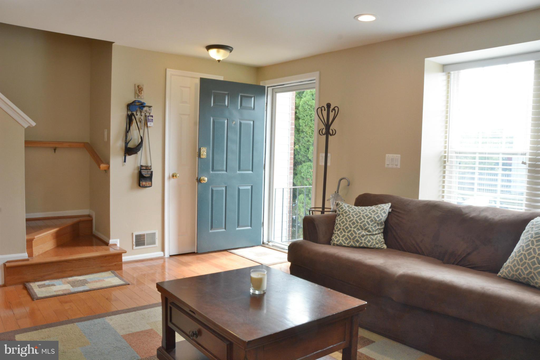 45322 Gable Square Sterling, VA 20164 - Photo 3 of 30 a living room with furniture and a window