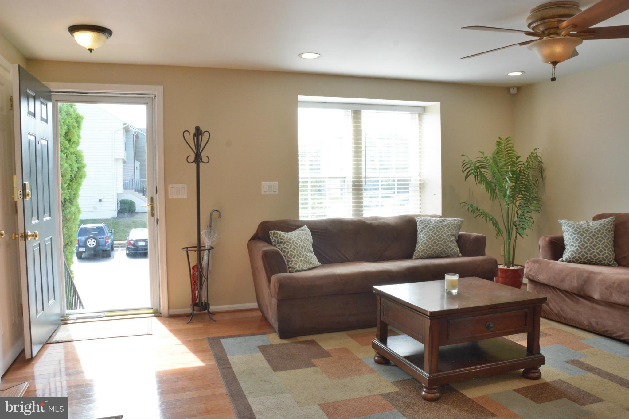 45322 Gable Square Sterling, VA 20164 - Photo 4 of 30 a living room with furniture and a large window