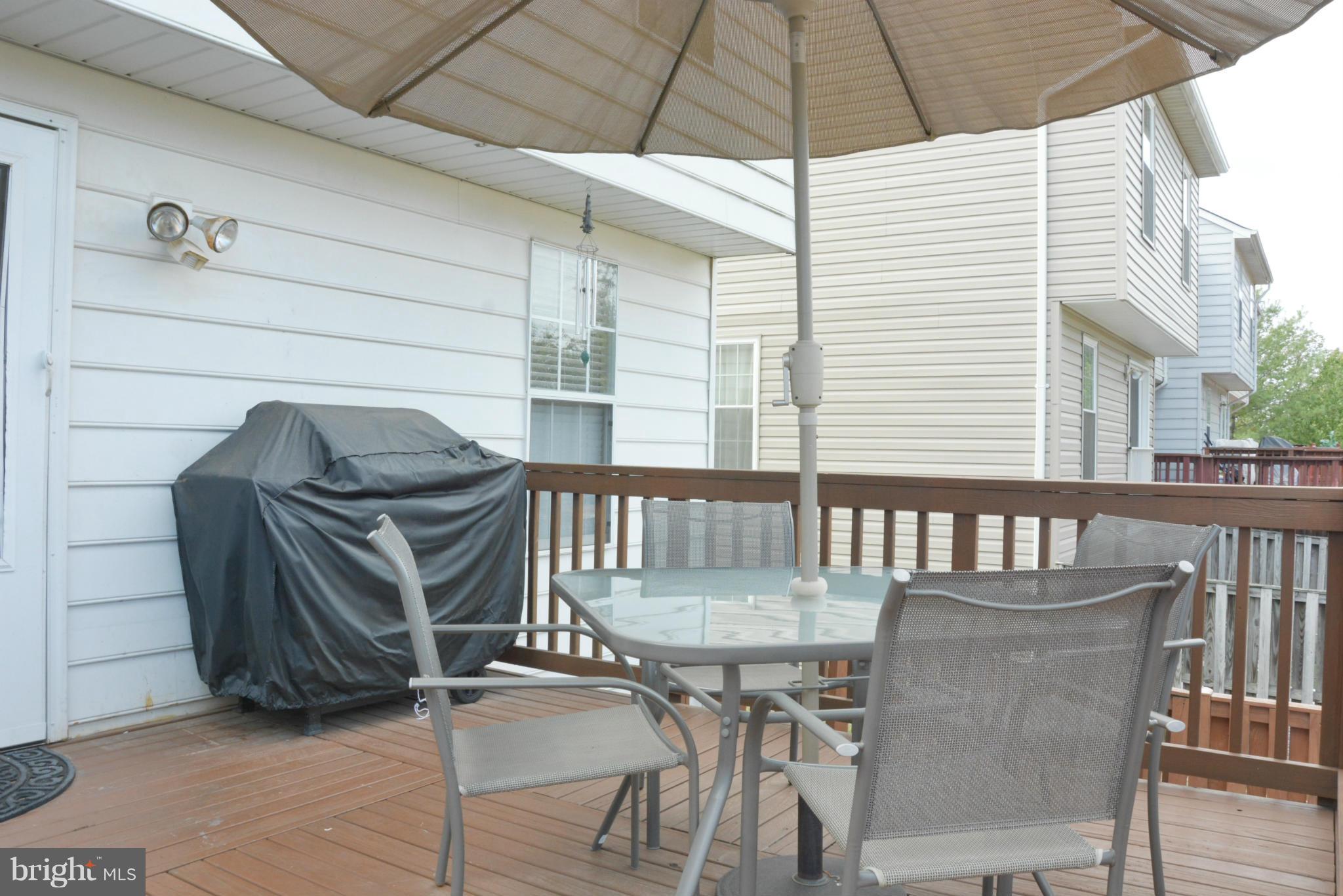 45322 Gable Square Sterling, VA 20164 - Photo 8 of 30 a balcony with table and chairs