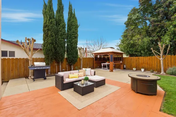 a outdoor space with patio lots of furniture and mountain view