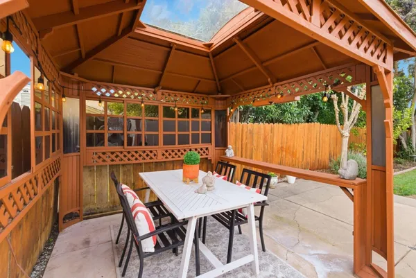 a view of chair and table in the patio