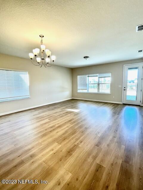 3796 Eagle Rock Road Middleburg, FL 32068 - Photo 5 of 7 wooden floor in an empty room with a window