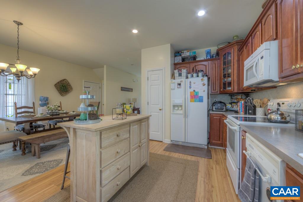 325 High View Road Stanardsville, VA 22973 - Photo 15 of 30 a kitchen with a sink refrigerator and cabinets