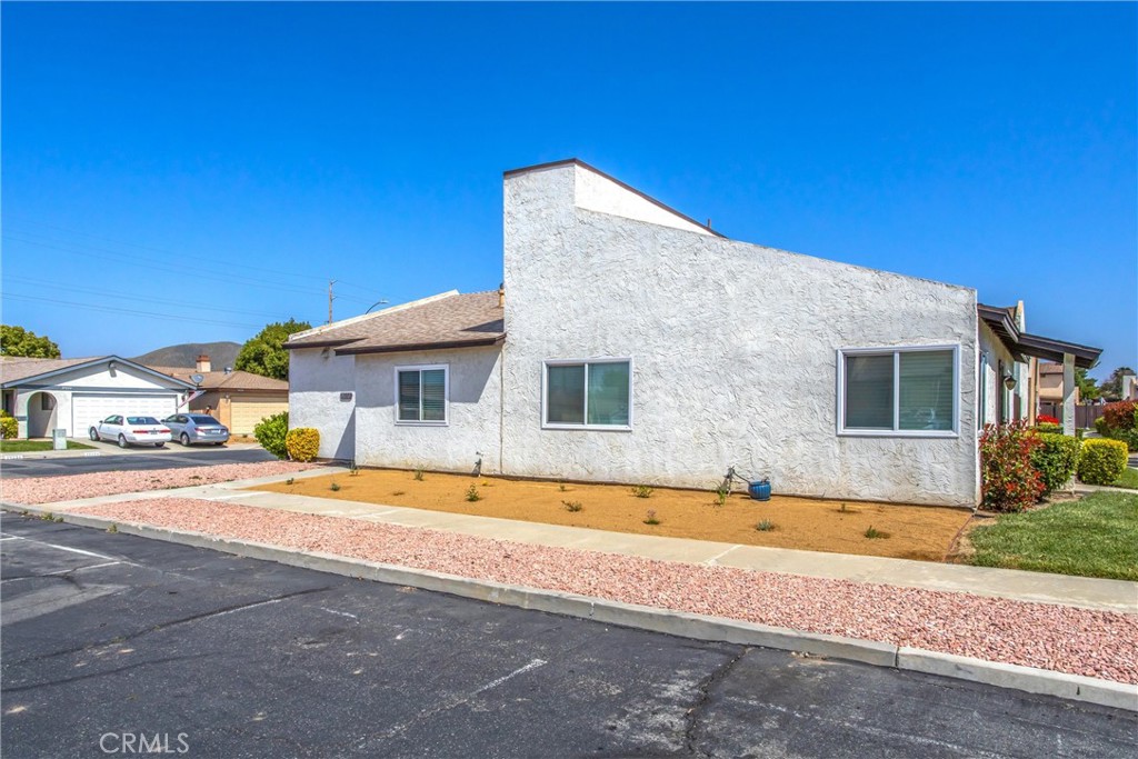 29252 Murrieta Road Menifee, CA 92586 - Photo 23 of 28 a front view of house with yard
