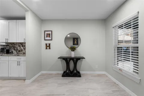 a view of a living room and window