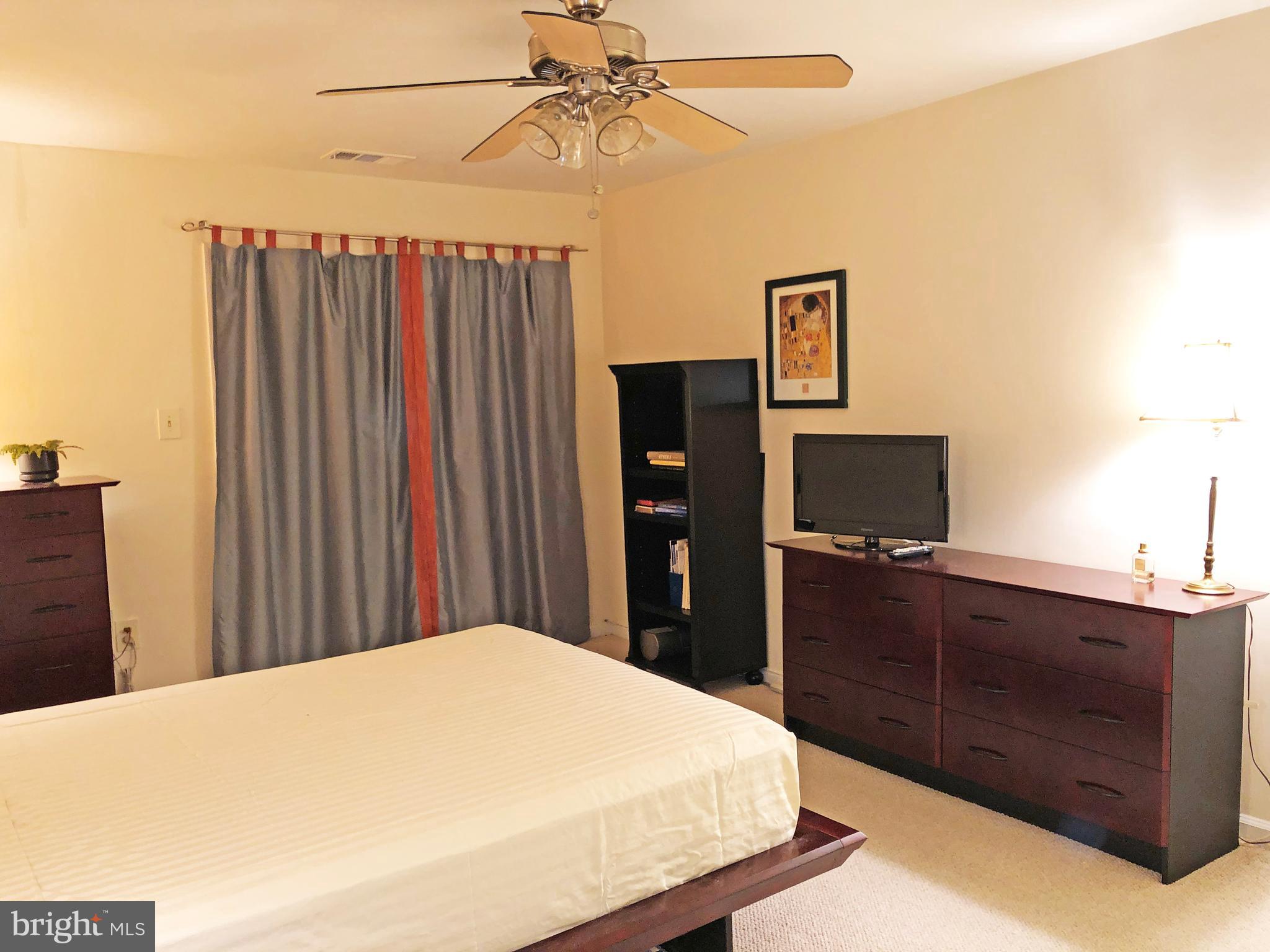 1575 Church Hill Place, Unit 1575 Reston, VA 20194 - Photo 12 of 31 Owner's Bedroom leads to small patio