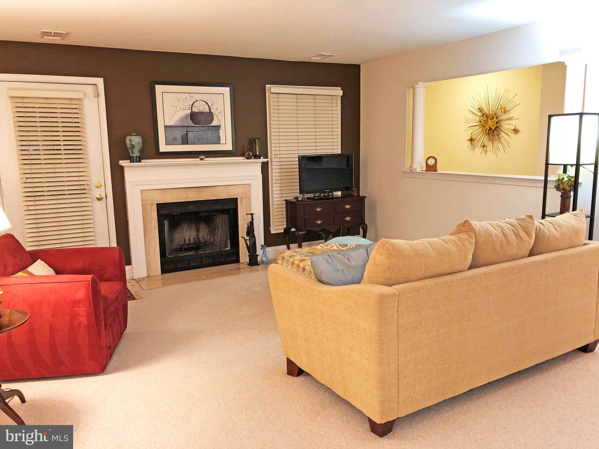 1575 Church Hill Place, Unit 1575 Reston, VA 20194 - Photo 6 of 31 Living Room with fireplace and w/w