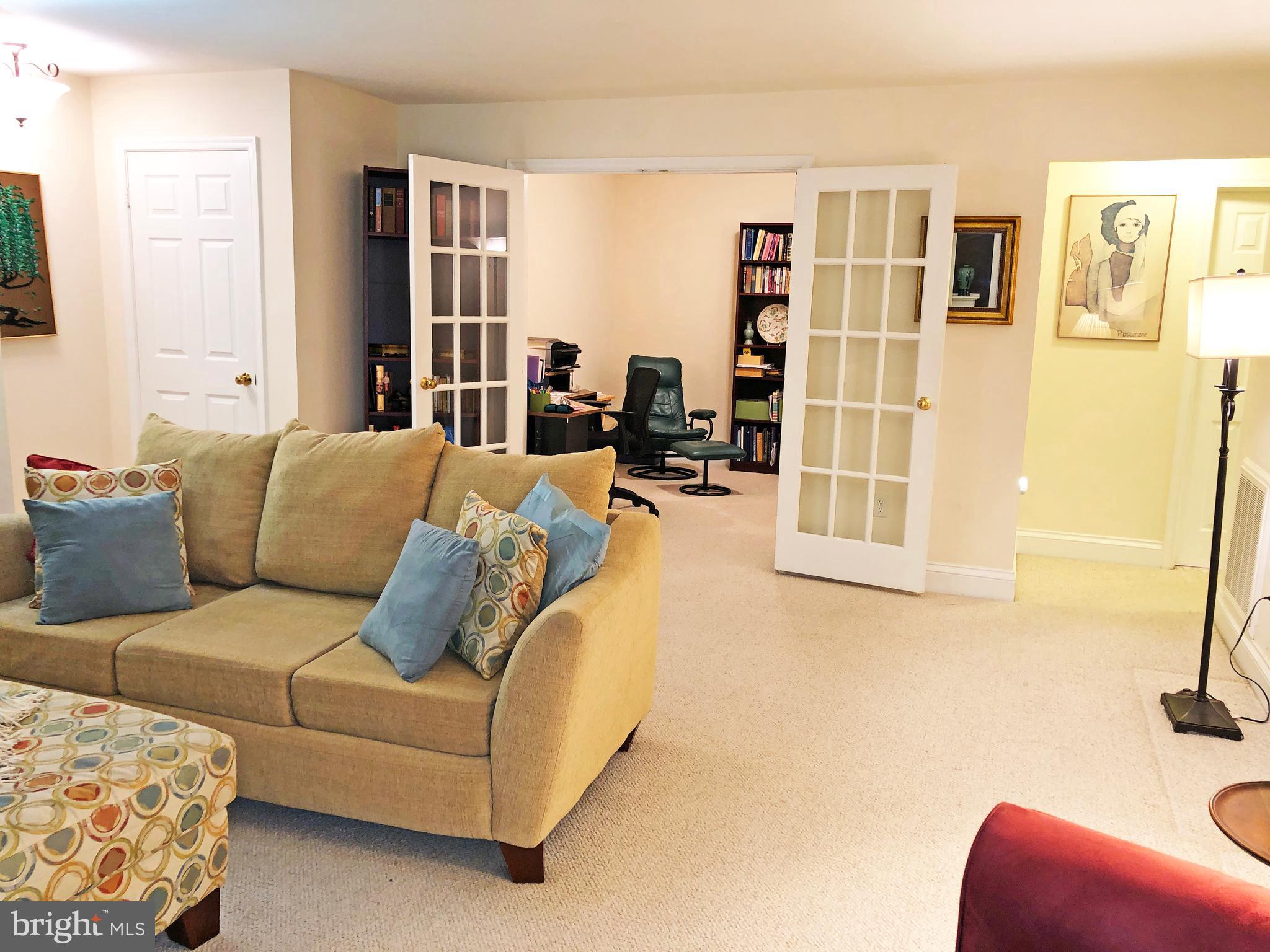 1575 Church Hill Place, Unit 1575 Reston, VA 20194 - Photo 7 of 31 Living Room adjoins Den