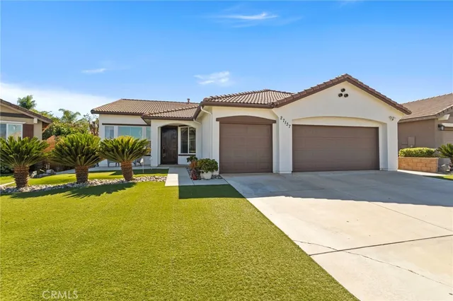 a front view of a house with swimming pool
