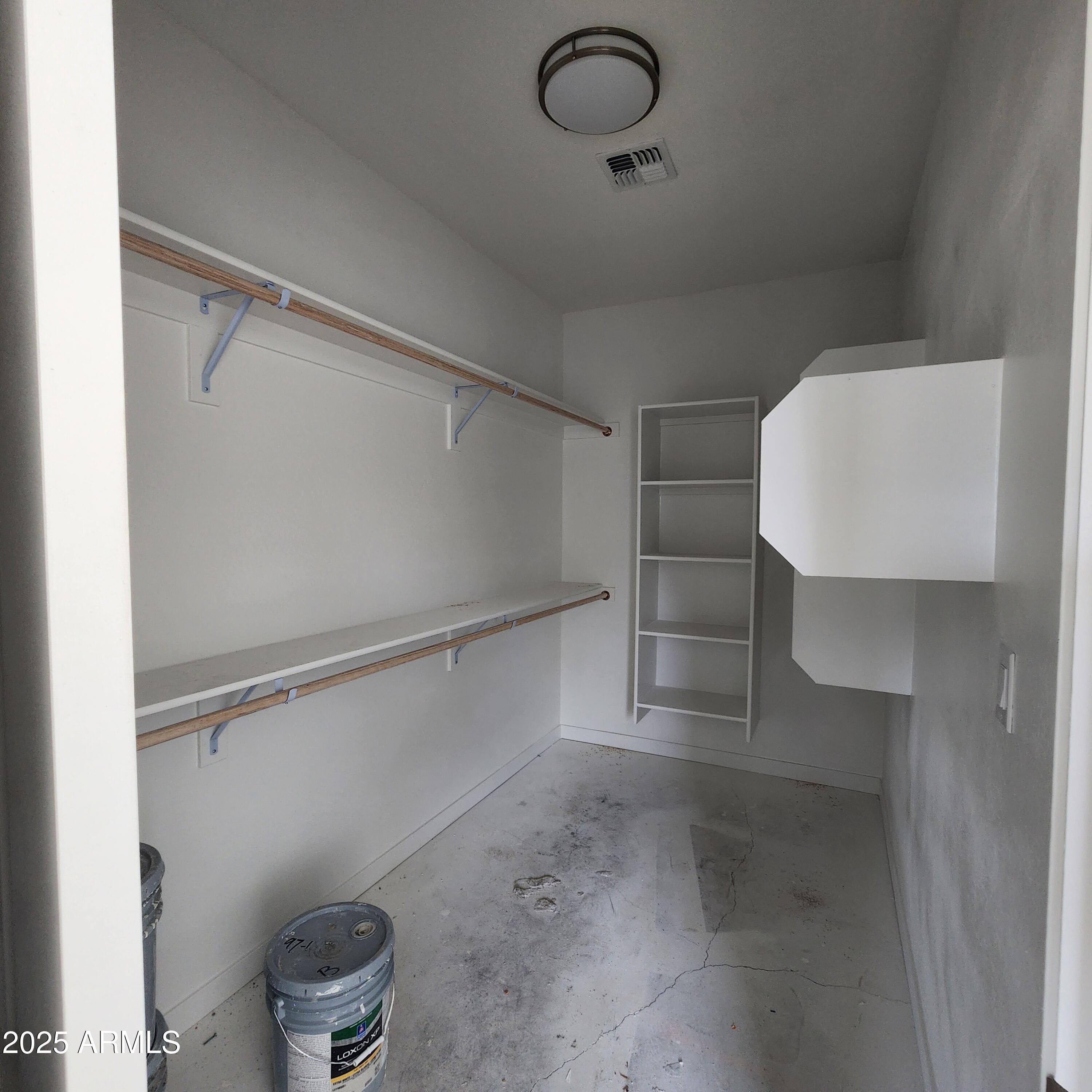 22232 West Skinner Road Wittmann, AZ 85361 - Photo 8 of 12 1651 MASTER BEDROOM CLOSET