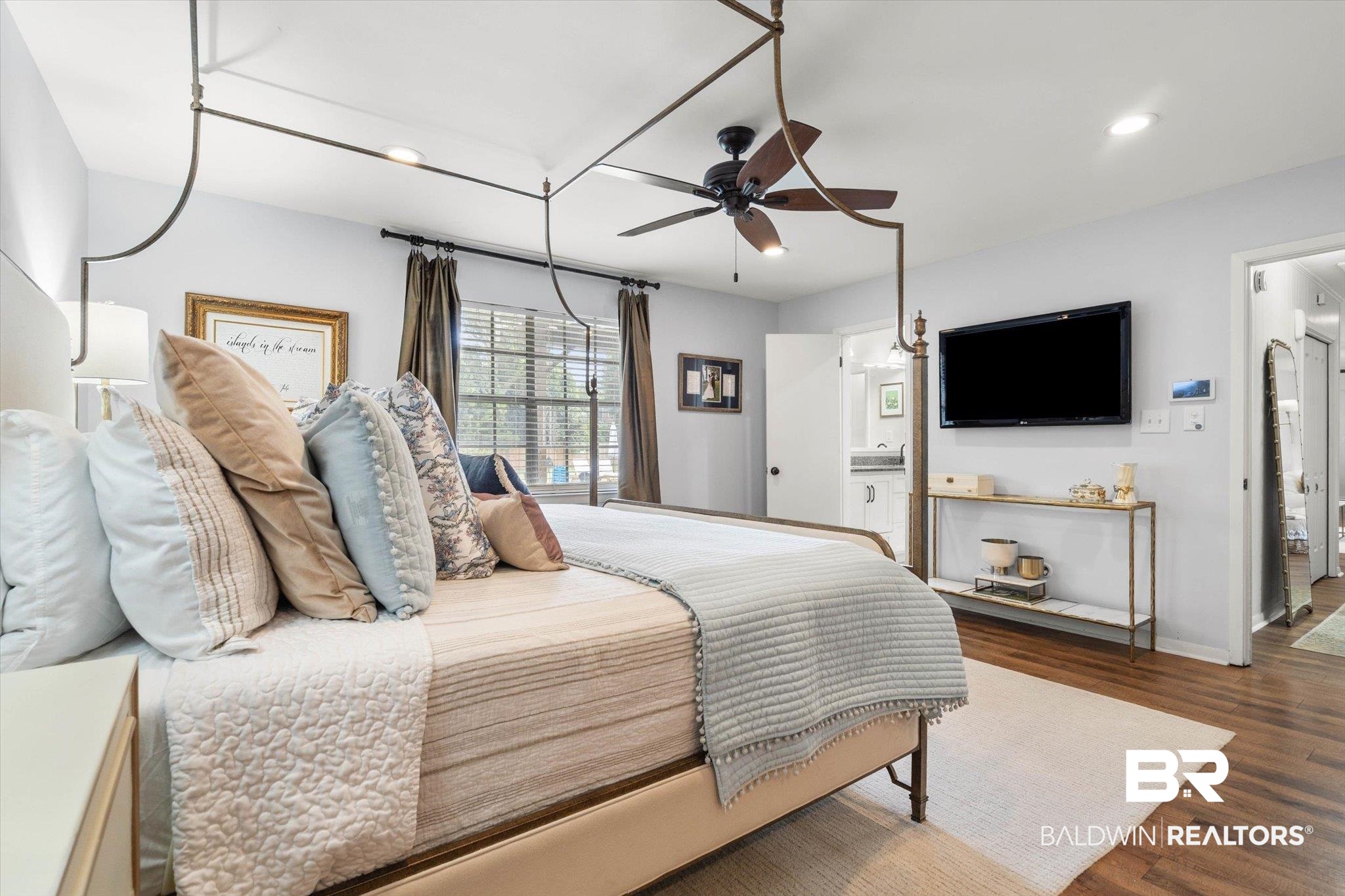 254 Woodlands Avenue Mobile, AL 36607 - Photo 18 of 50 Bedroom with wood finished floors, recessed lighting, a ceiling fan, and connected bathroom